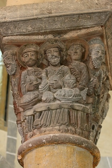 The multiplication of the loaves and fishes capital 1 of 6 in the choir 12th century saint nectaire church auvergne france